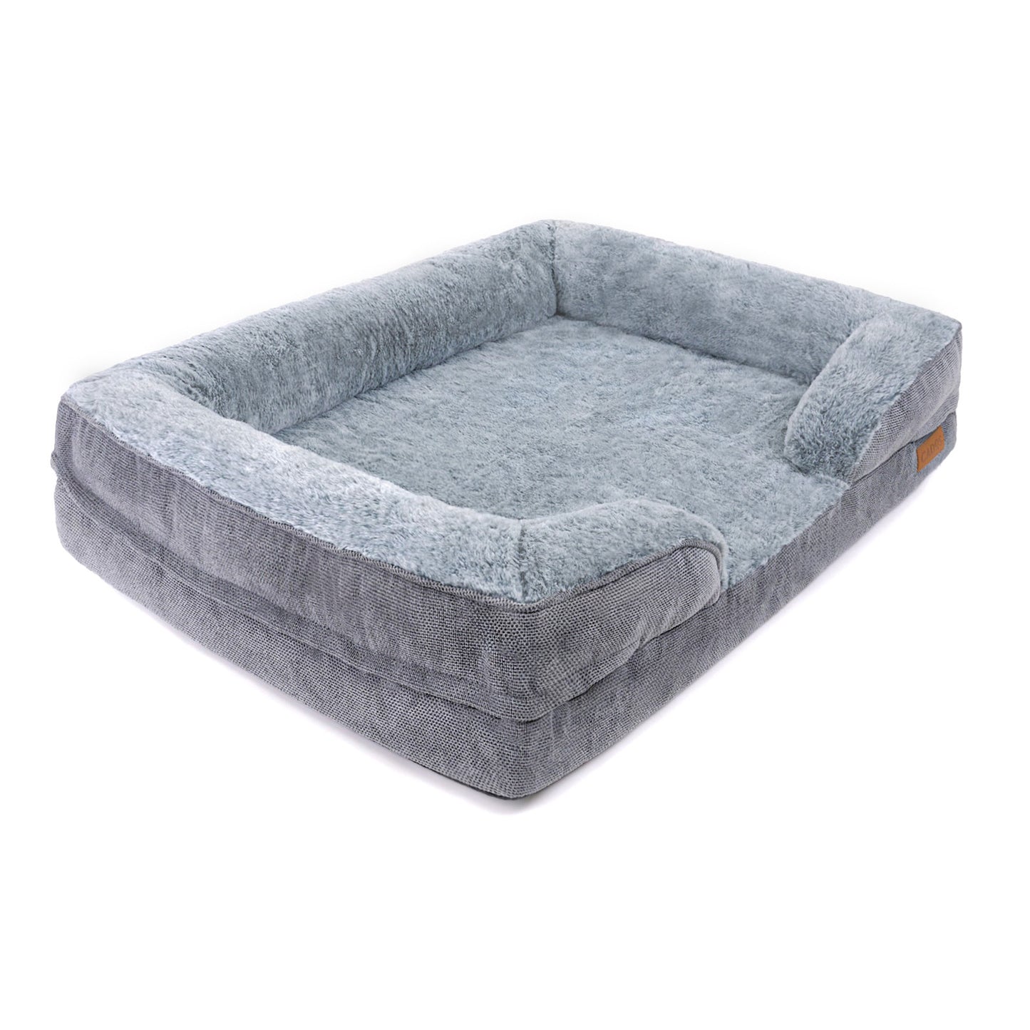 A plush orthopedic support mattress bed for dogs made of memory foam and covered in grey fabric, with a soft faux fur top. Side View