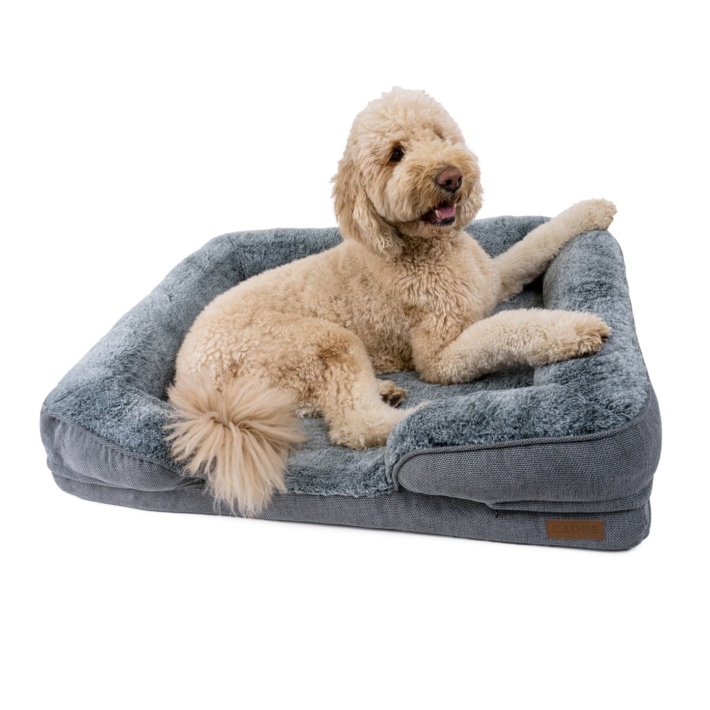 A light grey, plush orthopedic support mattress for dogs with a soft bolster around the edge, featuring a high-density memory foam mattress base and luxurious faux fur-style fabric.